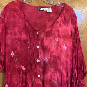 LA Vera dress.  It does have a hole in one of the seams. Size 3x